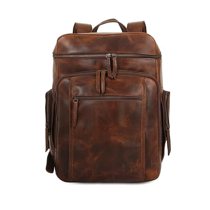 A Dark brown full-grain leather laptop backpack with multiple pockets and a main zipper compartment, displayed against a plain background.